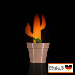 Kaktus Tischlampe projiziert warmes Licht als große Kakteen-Silhouette an die Wand