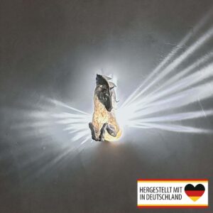 Leuchtende Wandlampe Pegasus mit strahlendem Lichtspiel an der Wand