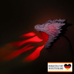 Wandlampe Feuerdrache mit rotem Feuerlichtstrahl an der Wand