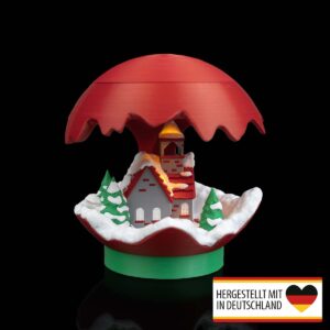 Weihnachtliche Tischlampe als Winterdorf-Kugel mit LED-Stern im Inneren